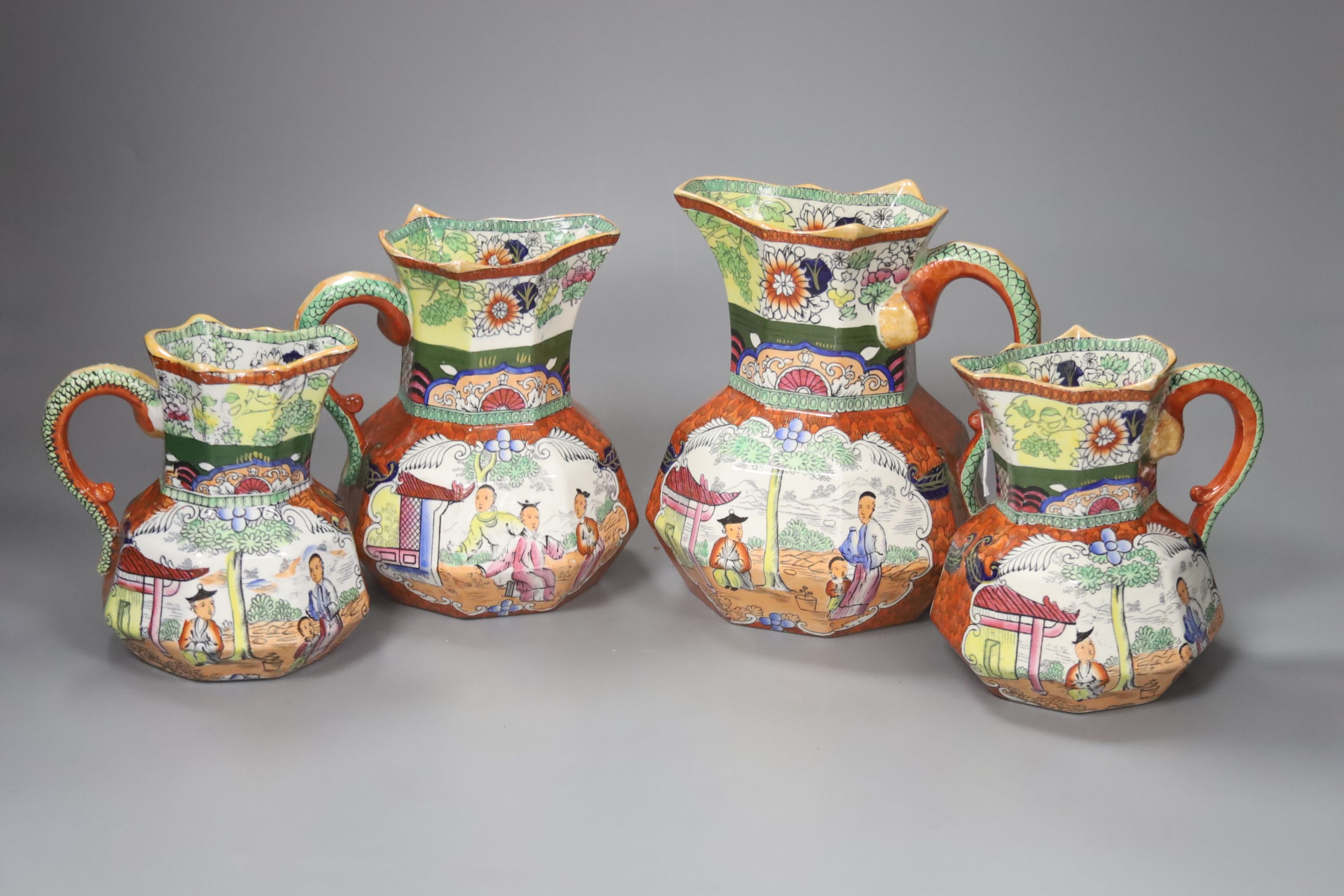 A graduating set of four Masons Ironstone jugs